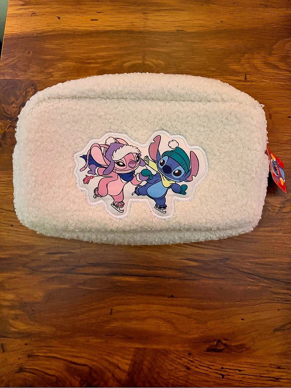 Disney Stitch and Angel Ice Skating Sherpa Pouch Pink & White